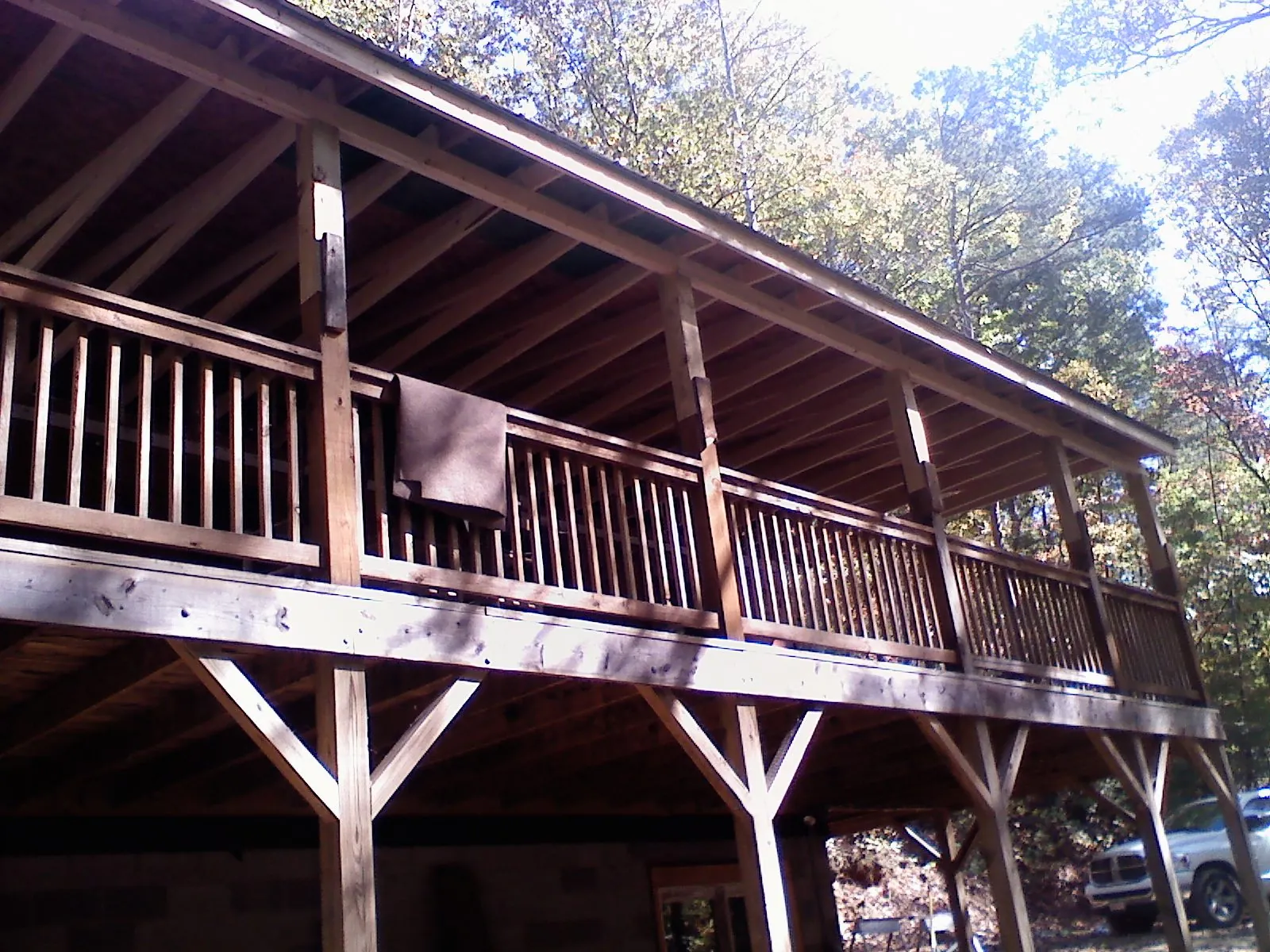 Timber framing under a new elevated porch and deck — Roof Leak Repair in Timberlake by Roofing Brothers